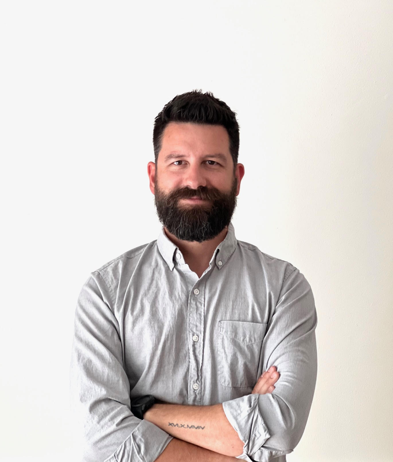 Vince Winteregg, founder of Elements Design Co., in a light gray button-down shirt.